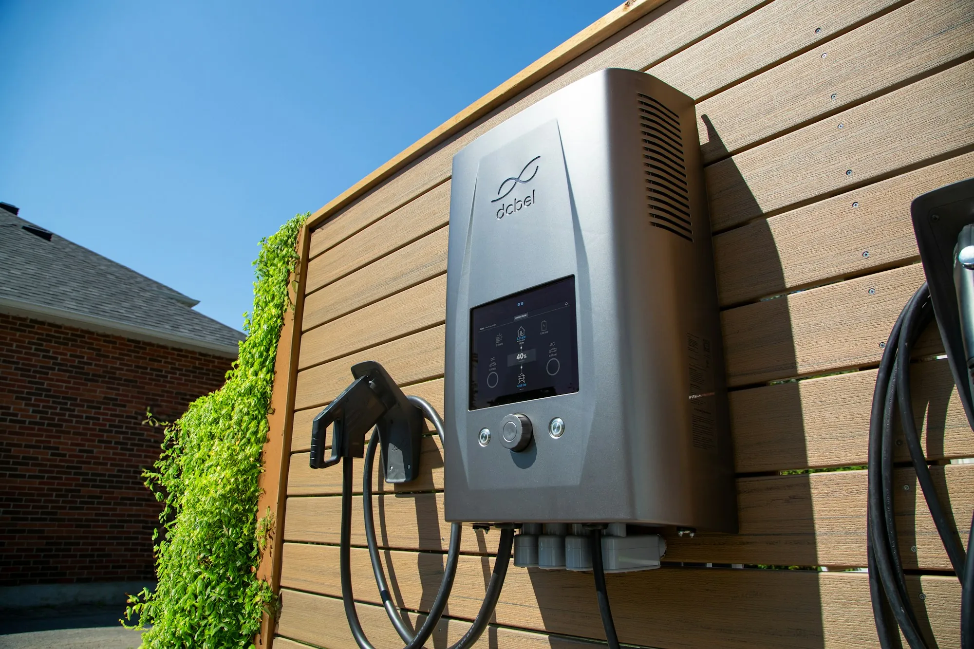 Electric car charger mounted on a wall